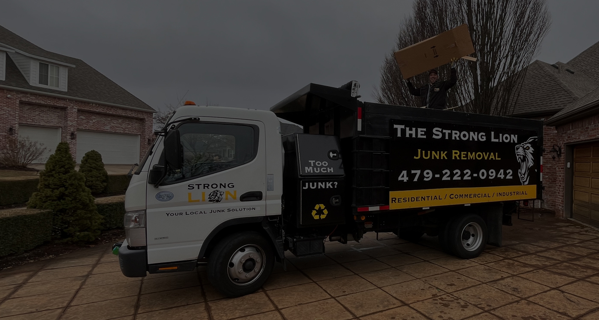 The Strong Lion Junk Removal Service Car